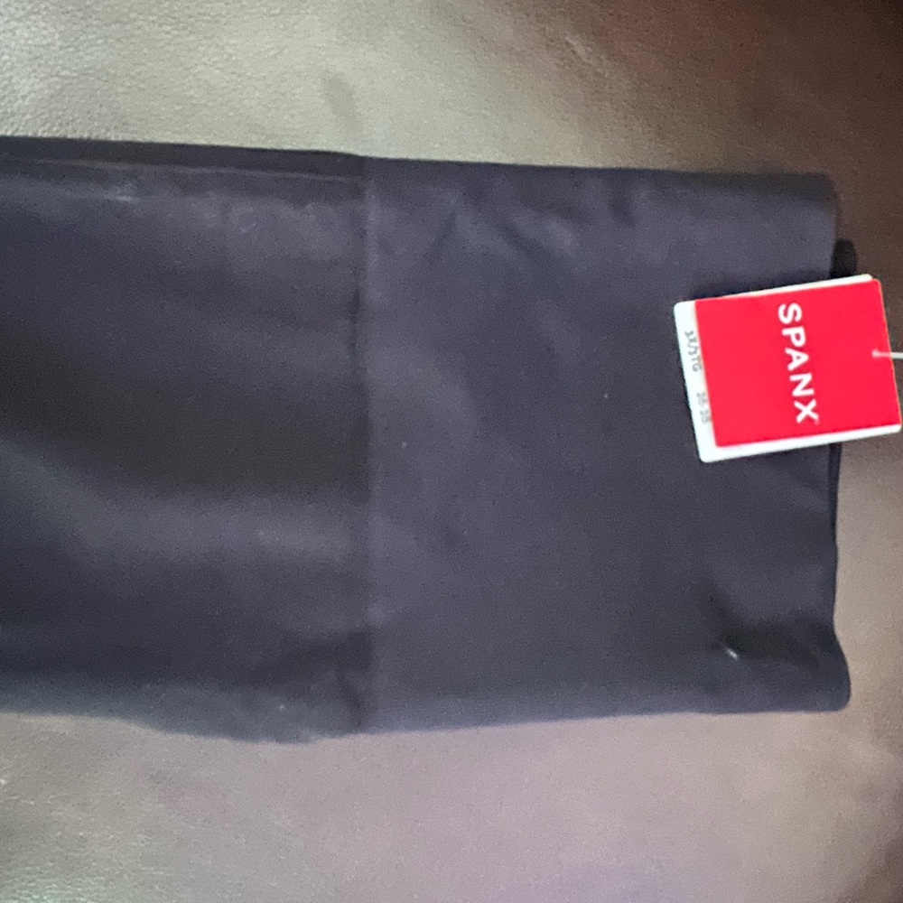 NWT BLACK SPANX in a size large.